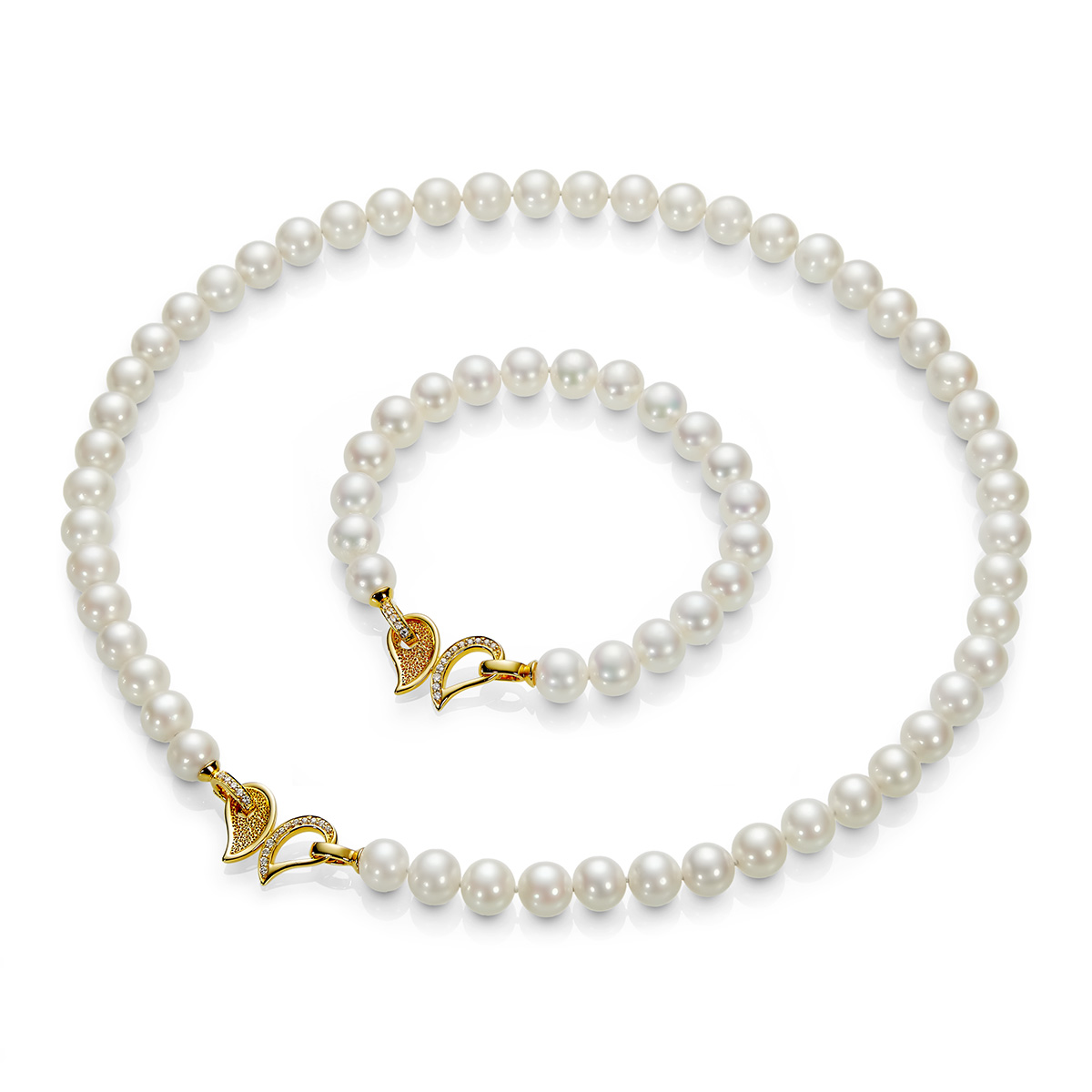 Ожерелье и браслет из белого жемчуга